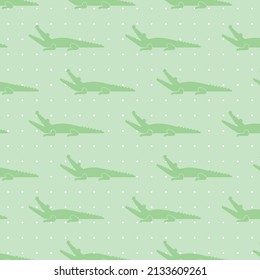 Green color crocodile patterns on green background with white dots, vector