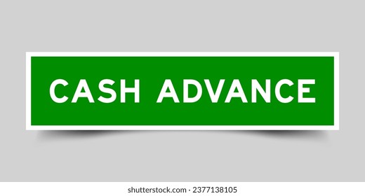 Green color square label sticker with word cash advance on gray background