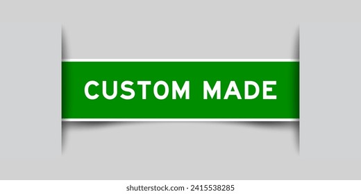 Green color square label sticker with word custom made that inserted in gray background
