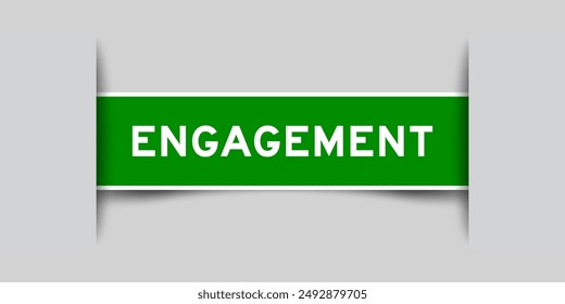 Green color square label sticker with word engagement that inserted in gray background