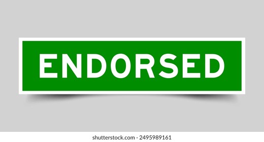 Green color square label sticker with word endorsed that inserted in gray background