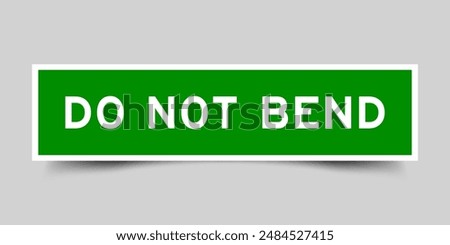 Green color square label sticker with word do not bend that inserted in gray background