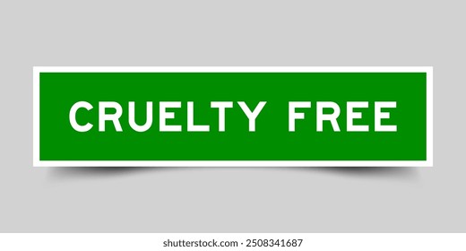 Green color square shape sticker label with word cruelty free on gray background