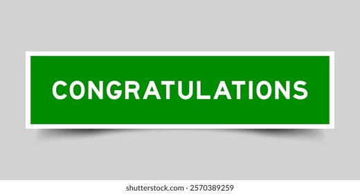 Green color square shape sticker label with word congratulations on gray background