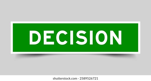 Green color square shape sticker label with word decision on gray background