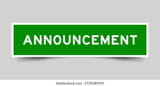Green color square shape sticker label with word announcement on gray background