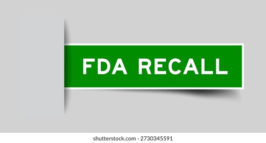 Etiqueta adesiva de forma quadrada de cor verde com a palavra FDA recall inserida no fundo cinza