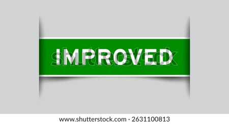 Green color square shape sticker label with word improved inserted in gray background