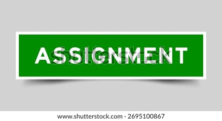 Green color square shape sticker label with word assignment on gray background