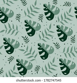 Green color tropical leaves seamless pattern.
Good for wallpaper, wrapping paper, textile Print.