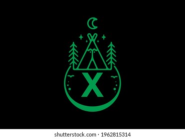 Color verde de la letra inicial X en el diseño de la placa de círculo de camping
