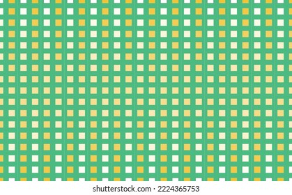 Green colored pattern with yellow and white square. Plaid pattern.