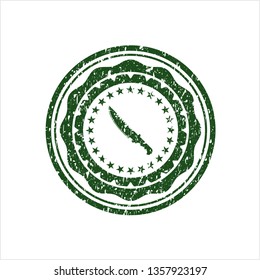 Green combat knife icon inside distress rubber seal