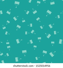 Green Container on crane icon isolated seamless pattern on green background. Crane lifts a container with cargo.  Vector Illustration