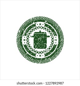 Green cooking pot icon inside rubber stamp with grunge texture
