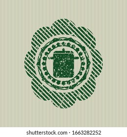 Green cooking pot icon inside distressed rubber texture