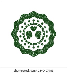Green couple in love icon inside distressed rubber grunge texture seal
