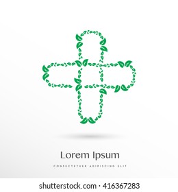 green cross made by leafs vector logo / icon