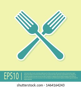 Green Crossed fork icon isolated on yellow background. Cutlery symbol.  Vector Illustration