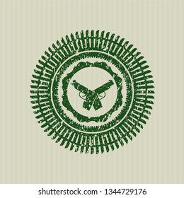 Green crossed pistols icon inside rubber grunge texture seal