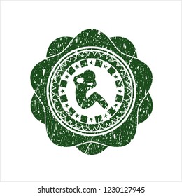 Green crunch icon inside distressed rubber grunge texture seal