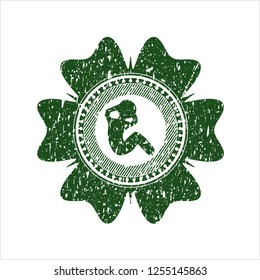 Green crunch icon inside distressed grunge style stamp