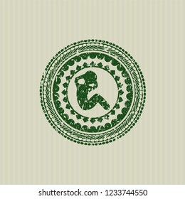 Green crunch icon inside rubber stamp