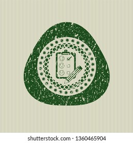 Green customer feedback icon inside rubber seal with grunge texture