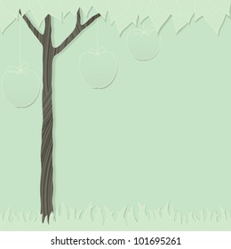 green cutout card as stylized apple tree and grass