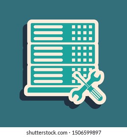 Green Database server with screwdriver and wrench icon isolated on blue background. Adjusting, service, setting, maintenance, repair, fixing. Long shadow style. Vector Illustration