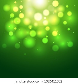 Green defocused bokeh light abstract background.