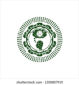 Green depression icon inside distressed rubber grunge seal
