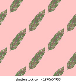Green diagonal feather print seamless pattern in hand drawn style. Pink pastel background. Designed for fabric design, textile print, wrapping, cover. Vector illustration.