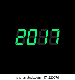 Green digital numbers 2017 year time on a black background.