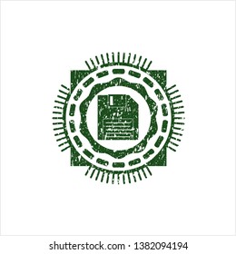 Green diskette icon inside distressed rubber stamp with grunge texture