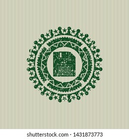 Green diskette icon inside rubber stamp with grunge texture