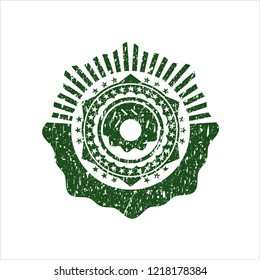 Green donut icon inside distress grunge stamp