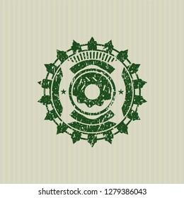 Green donut icon inside distress rubber stamp