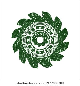 Green donut icon inside rubber grunge seal