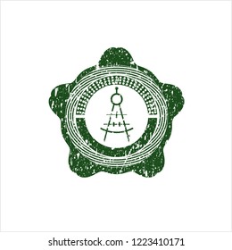 Green drawing compass icon inside distress rubber stamp with grunge texture