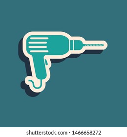 Green Drill machine icon isolated on blue background. Long shadow style. Vector Illustration
