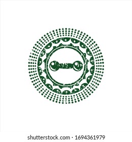 Green dumbbell icon inside distress grunge stamp