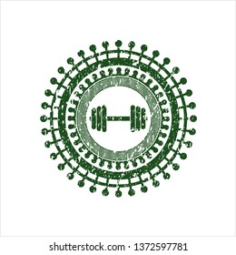 Green dumbbell icon inside distressed rubber grunge texture seal