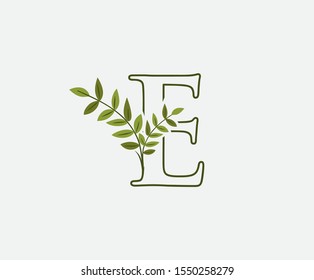 Green E Letter Logo Icon. Nature Green Leaves E Letter Design. Eco Concept ,  Created with Green Leaves and  Branches.  