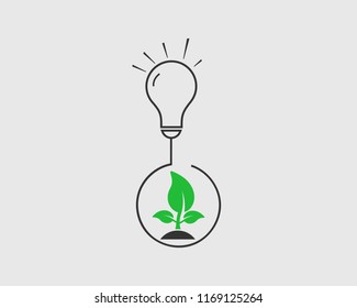 Green eco  energy icon. Light bulb with plant symbol.