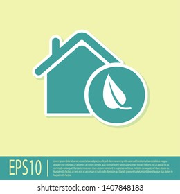 Green Eco friendly house icon isolated on yellow background. Eco house with leaf. Vector Illustration