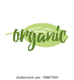 Green eco label with text Organic decorated green hand drawn leave shape. Artistic vector element for labels, logos, badges, stickers or icons. Calligraphic and typographic design for natural product