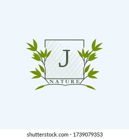 Green eco letter J logo with leaves in square shape. Initials with botanical elements with Floral letter design for business identity style