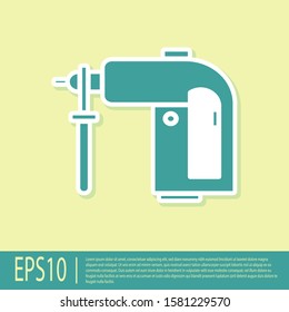 Green Electric rotary hammer drill machine icon isolated on yellow background. Working tool for construction, finishing, repair work.  Vector Illustration