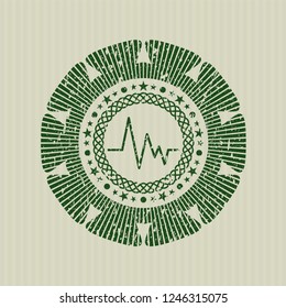 Green electrocardiogram icon inside distress rubber texture